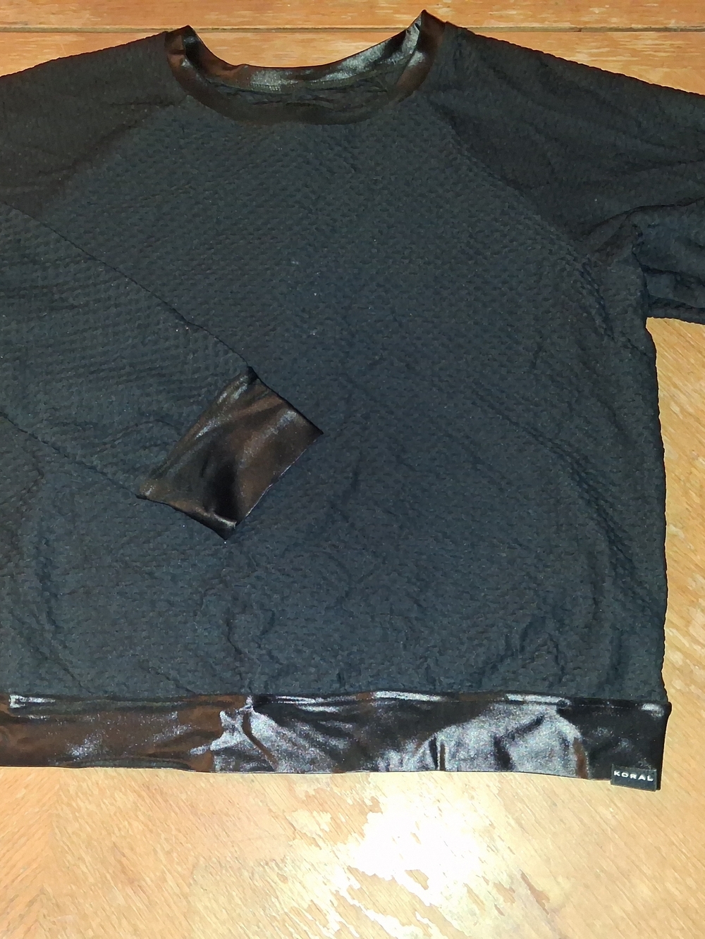 Koral Black Textured Sweatshirt with Shiny Logo Tag